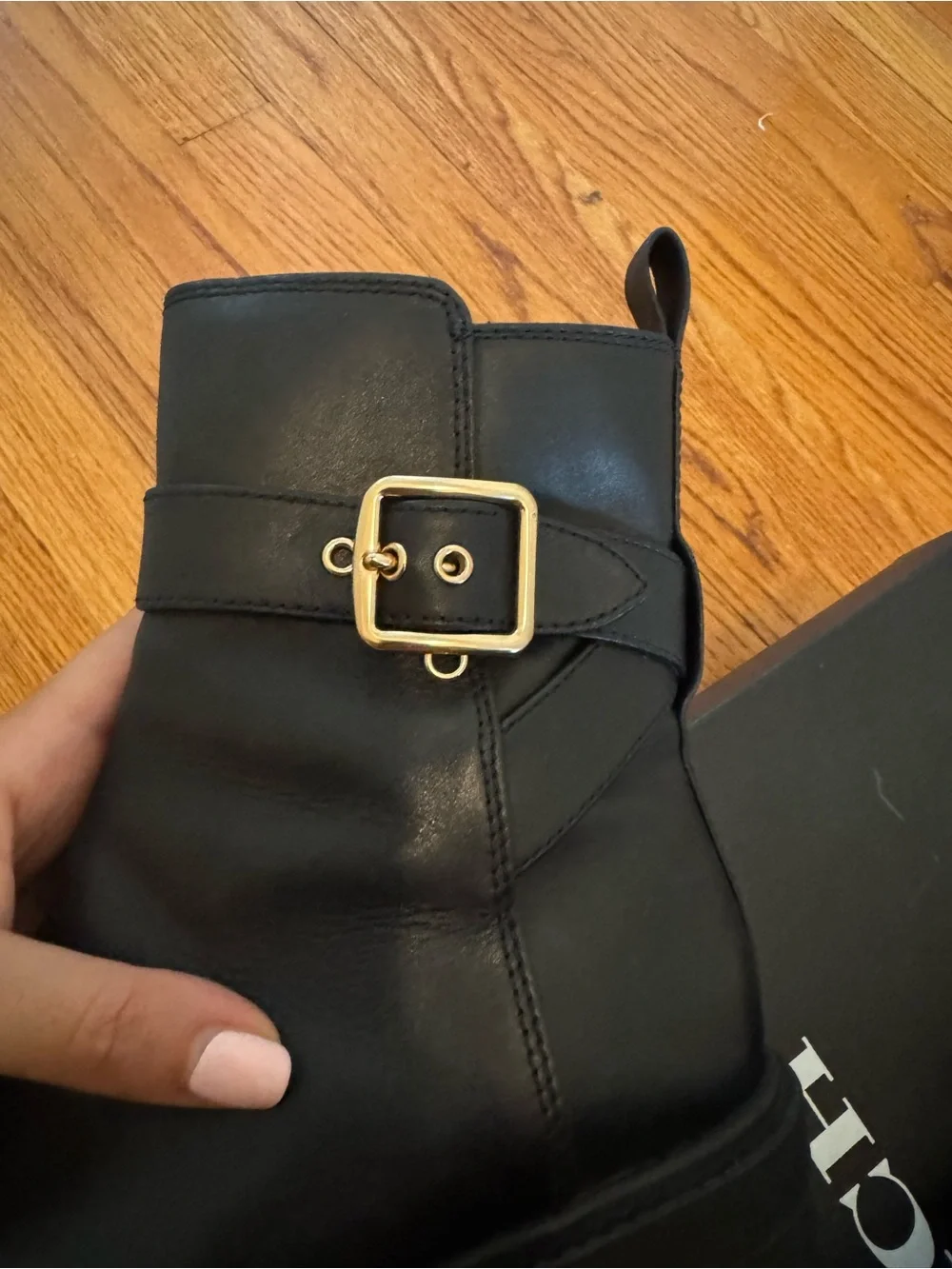 Coach Black Leather Ankle Boots with Gold Buckle Accent